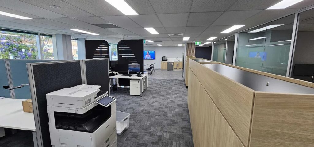 This image showcased a fully rewired office space with upgraded lighting and power points, completed by a commercial electrician.