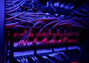 Structured Data Cabling: A well-organized array of data cables connected to network equipment in a structured cabling system.