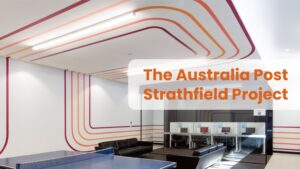 A bright, modern office area showcasing Lightspeed Electrical’s commercial electrician precise lighting installation for Australia Post Strathfield.