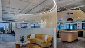 Discover how integrated commercial LED lighting transforms breakrooms and lounges. Lightspeed Electrical designs custom lighting for modern, multi-functional office spaces.
