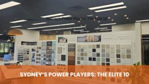 Best Commercial Electricians. Sydney’s Power Players: The Elite 10 text over a photo of a commercial showroom displaying roofing, paint, and cladding samples.