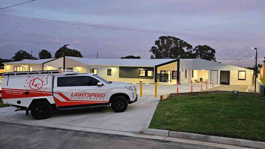 Lightspeed commercial electrician in Sydney parked at Little Zak’s Academy providing compliance services.